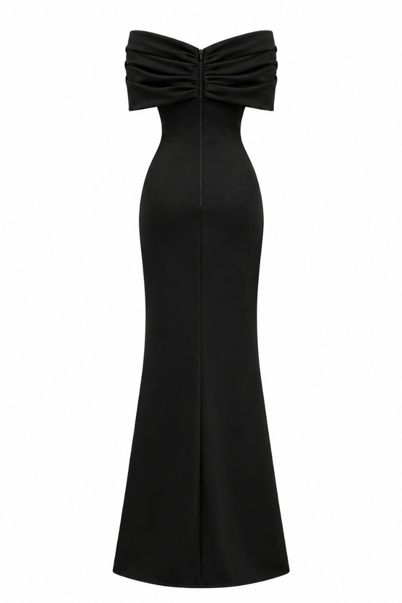 Nihan Peker Ghada black gown featuring elegant fabric and flowing silhouette, shown on a model.