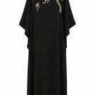 Nihan Peker NEEHAL Batwing gown in elegant fabric, showcasing flowing batwing sleeves and intricate design details.
