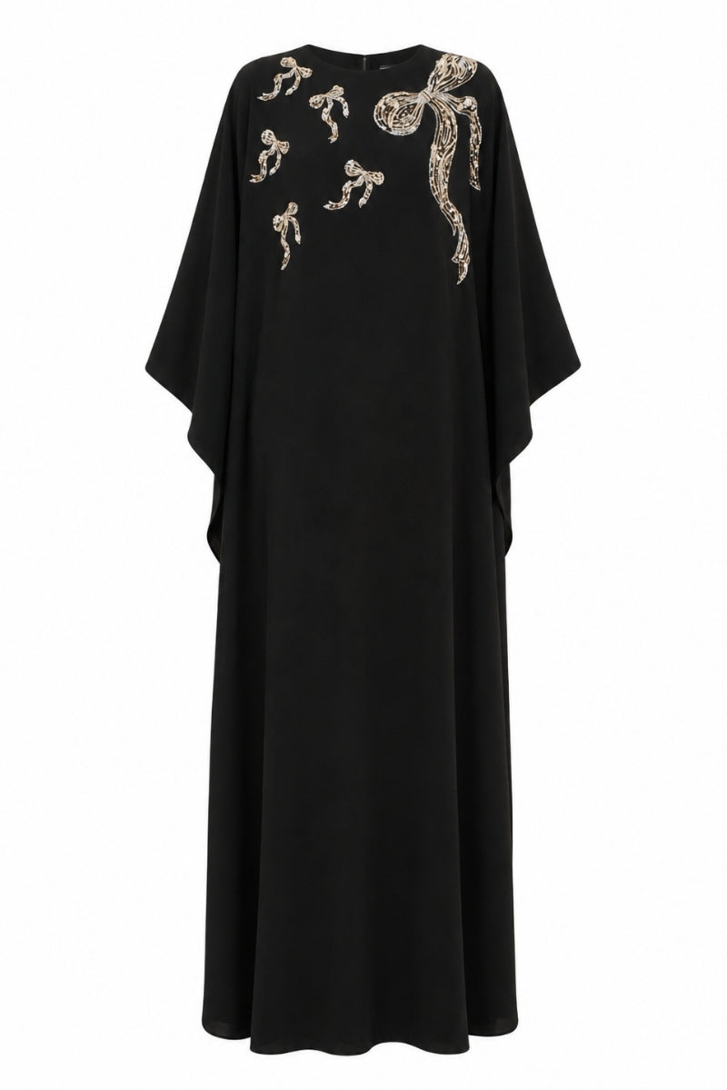 Nihan Peker NEEHAL Batwing gown in elegant fabric, showcasing flowing batwing sleeves and intricate design details.