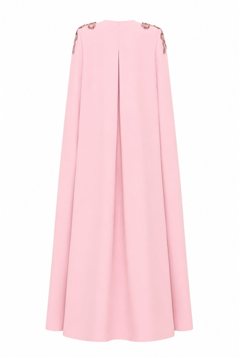 Nihan Peker Aura Pink Cape Gown elegant pink gown with cape detail, showcasing flowing fabric and sophisticated design.