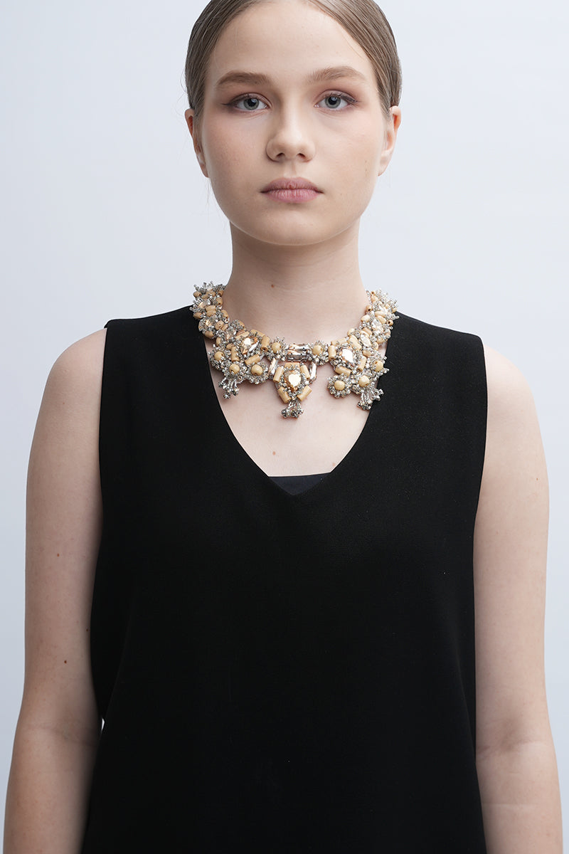 Aidan & Ice Sand Cascade Necklace featuring layered gold chains with sand-inspired pendants and elegant detailing.