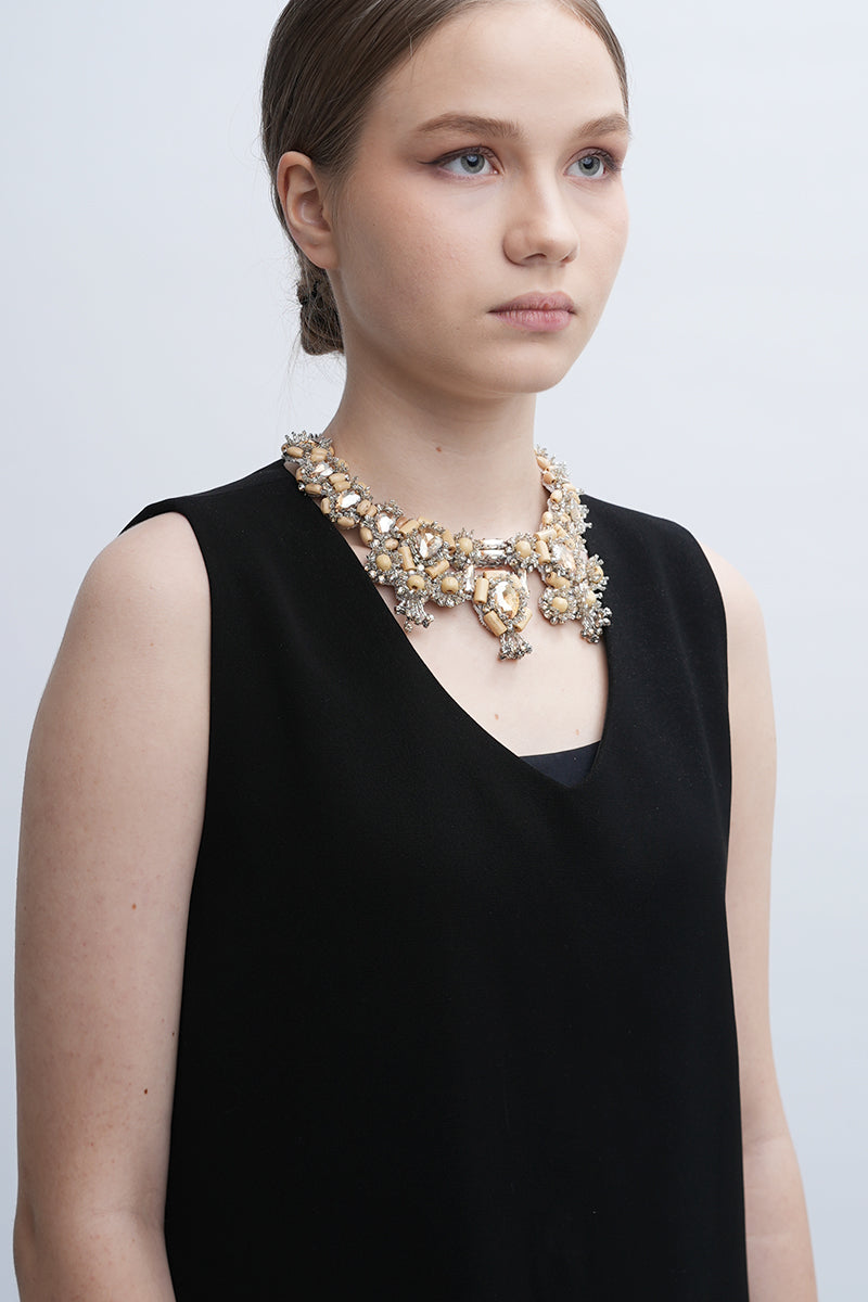 Aidan & Ice Sand Cascade Necklace featuring layered gold-toned chains with delicate pendant details.