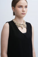 Aidan & Ice Sand Cascade Necklace featuring layered gold-toned chains with delicate pendant details.
