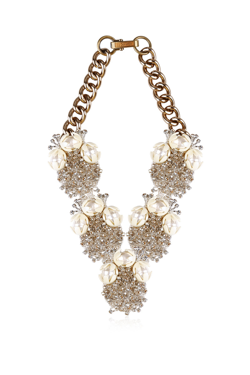Aidan & Ice Savanna white necklace featuring a delicate chain and elegant pendant on a plain background.