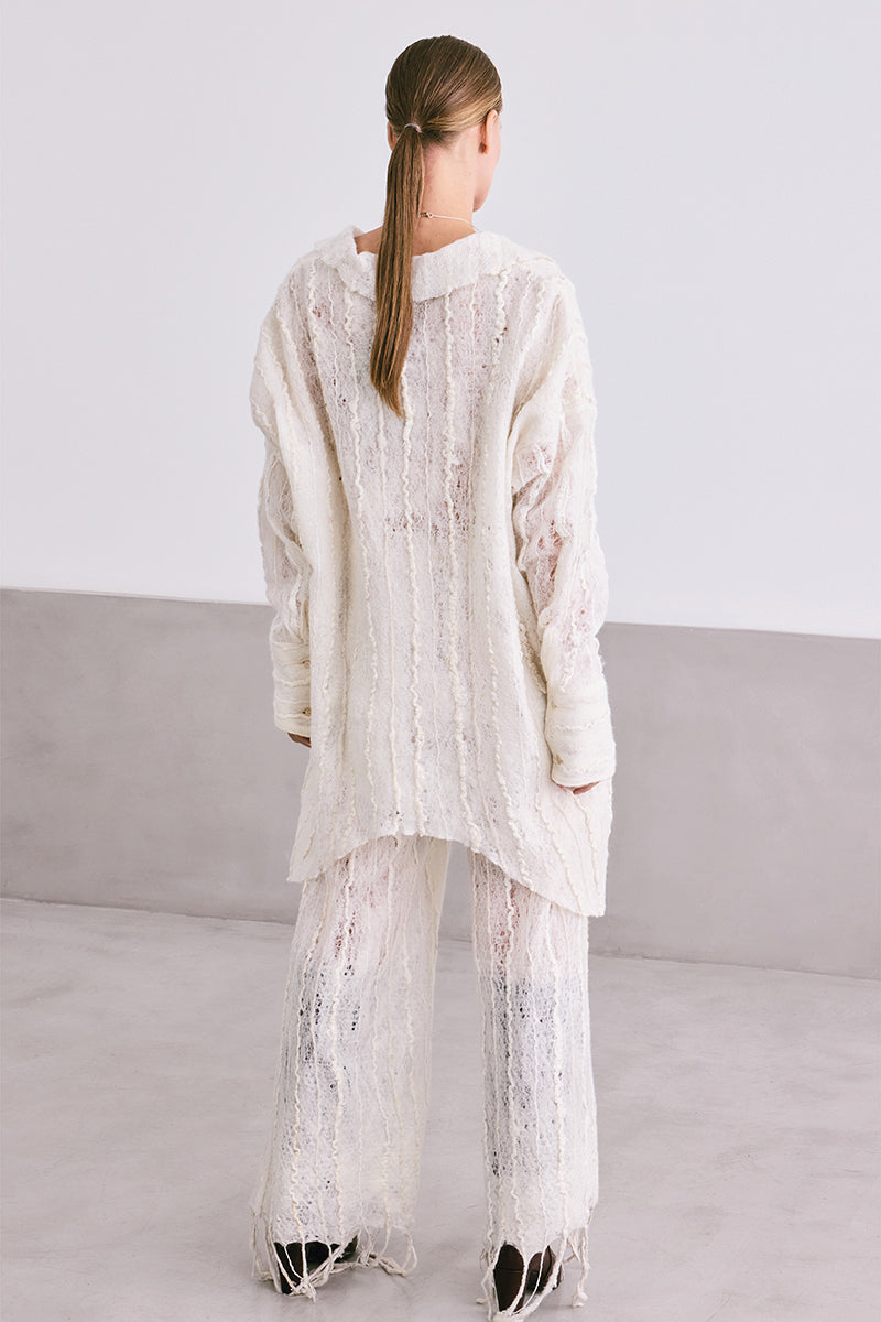 Maz Manuela Álvarez NUNO lace culotte trousers, stylish wide-leg pants with lace details, shown in a natural pose.