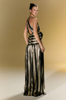 Luxurious Louvre Palace gown by Nur Karaata featuring elegant fabric and intricate design details.