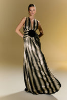 Elegant Nur Karaata Louvre Palace gown featuring intricate details and luxurious fabric, styled in a sophisticated evening look.