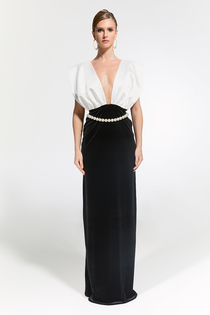 Elegant Nur Karaata Ciragan Palace gown with intricate detailing, flowing fabric, and sophisticated design for formal occasions.
