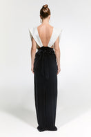 Elegant Nur Karaata Ciragan Palace gown featuring intricate embroidery and flowing fabric, perfect for formal occasions.