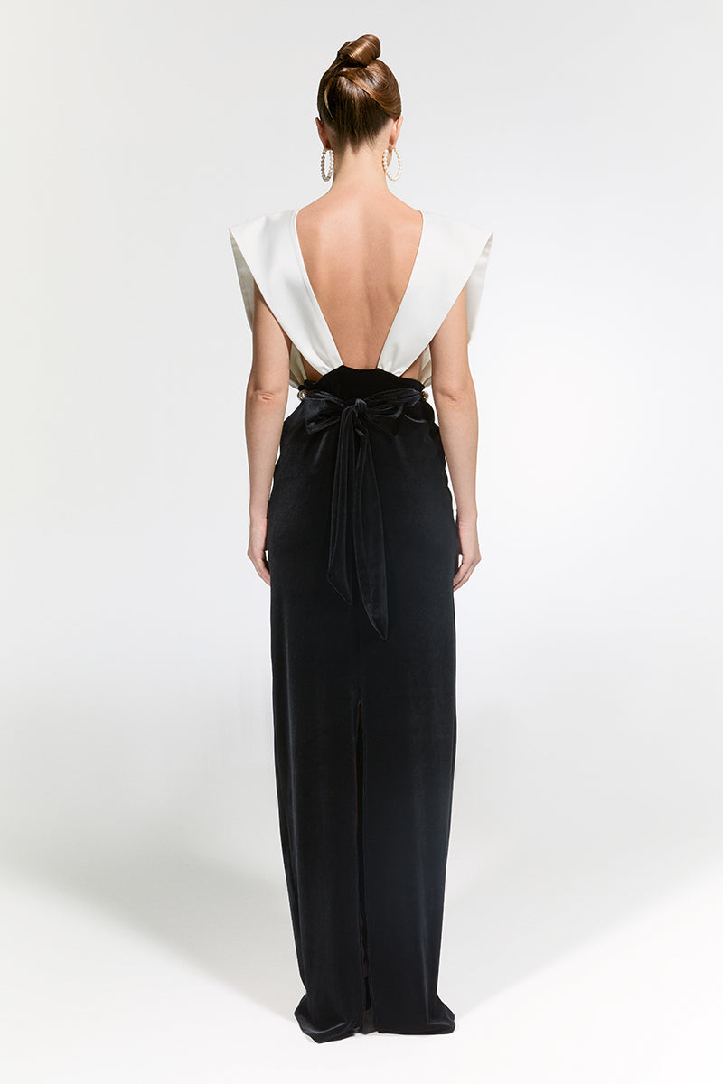 Elegant Nur Karaata Ciragan Palace gown featuring intricate embroidery and flowing fabric, perfect for formal occasions.