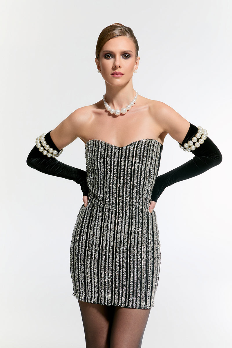 Nur Karaata Schloss mini dress featuring a stylish, fitted design perfect for casual or semi-formal wear.