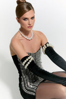 Nur Karaata Schloss mini dress, stylish short dress with a playful design, perfect for casual or semi-formal occasions.