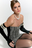 Nur Karaata Schloss mini dress, stylish short dress with elegant design, shown on a model in the product image.
