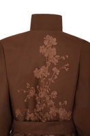 Nadya Shah mocha rose detail coat with elegant design and tailored fit, showcasing the stylish outerwear in a close-up view.