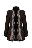 Nadya Shah Mercurial jacket displayed on a hanger, featuring a sleek design with a zip front and modern styling.