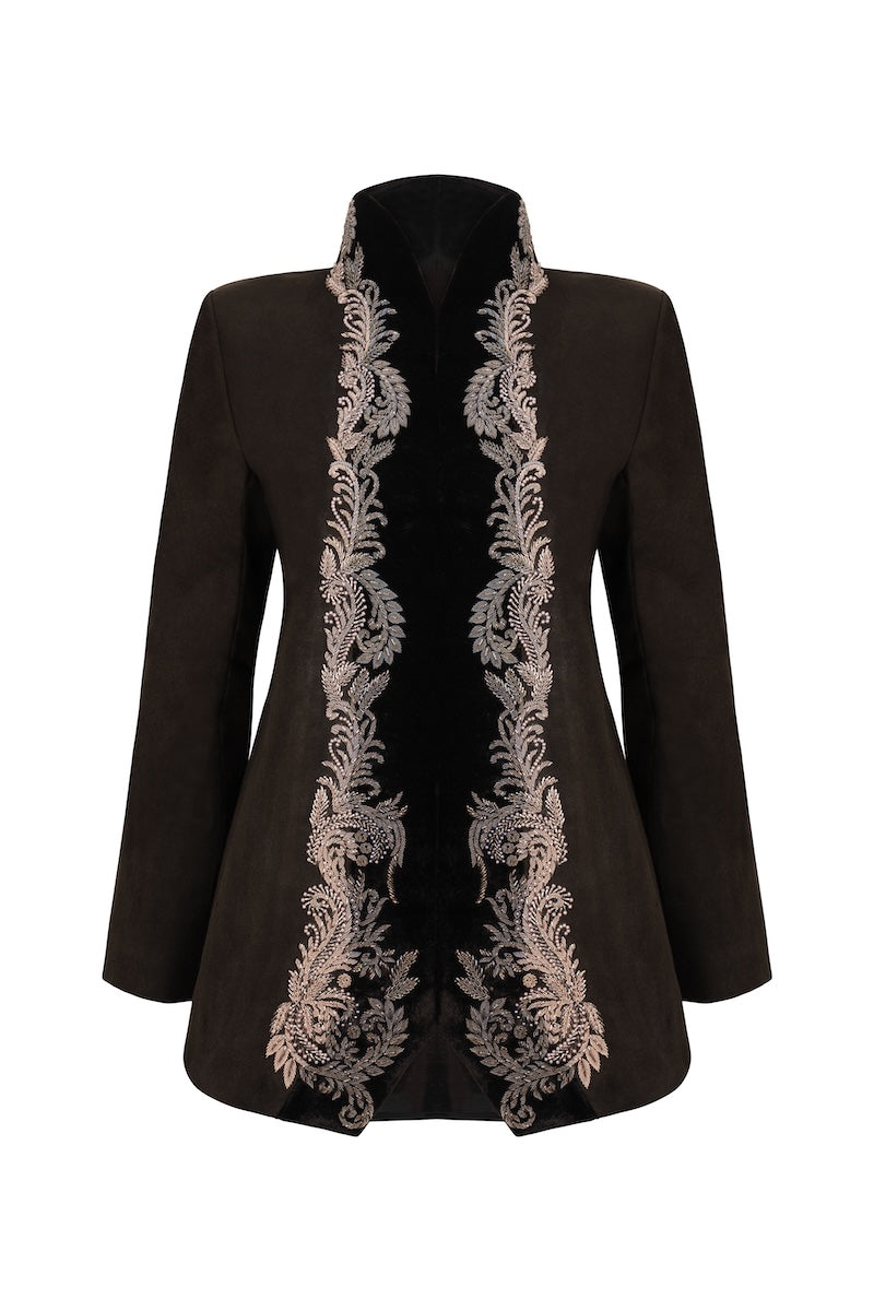 Nadya Shah Mercurial jacket displayed on a hanger, featuring a sleek design with a zip front and modern styling.