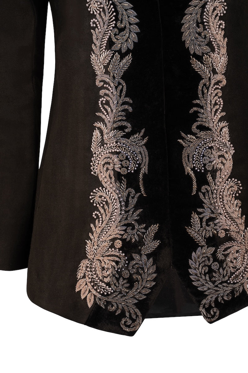 Nadya Shah Mercurial jacket in stylish fabric, shown on a hanger against a plain background.