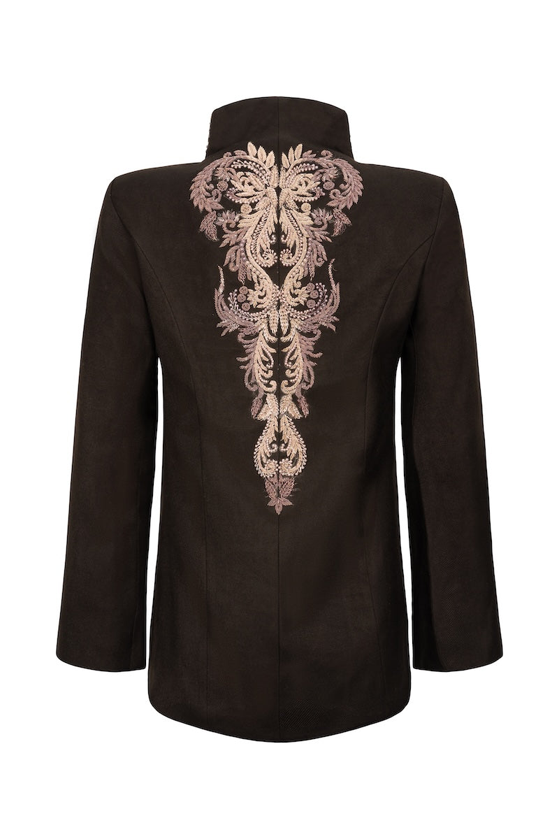 Nadya Shah Mercurial jacket, stylish outdoor jacket with a sleek design, shown in a vibrant color on a model.