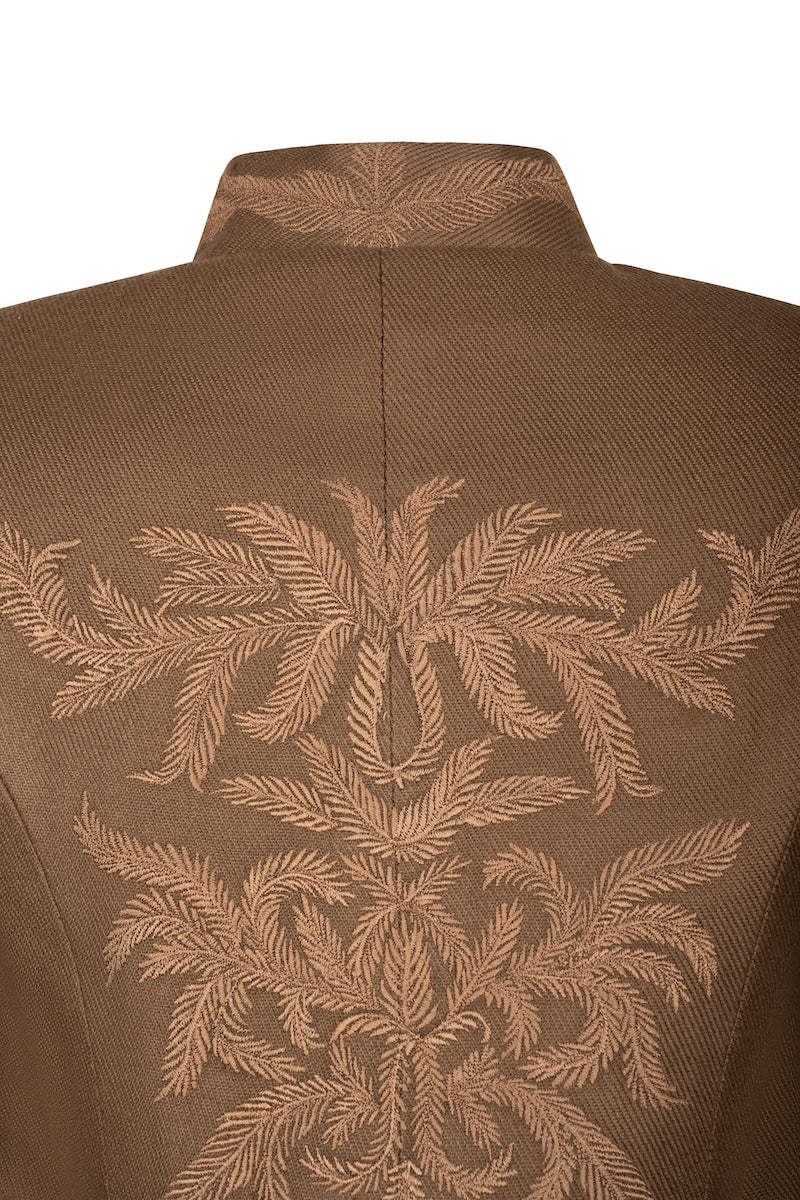 Nadya Shah Odessa jacket displayed on a hanger, featuring a stylish, lightweight jacket with a sleek design.