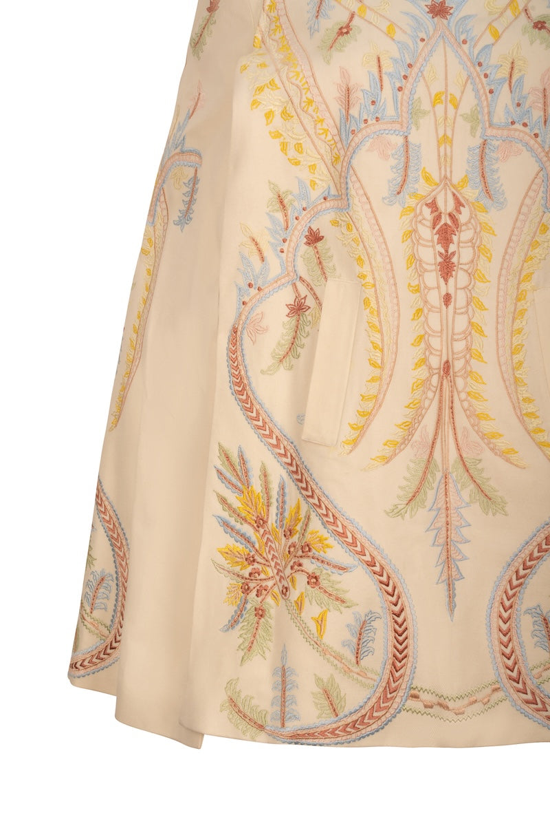 Elegant ivory Dorian cape jacket by Nadya Shah, showcasing flowing fabric and stylish design perfect for chic outerwear.