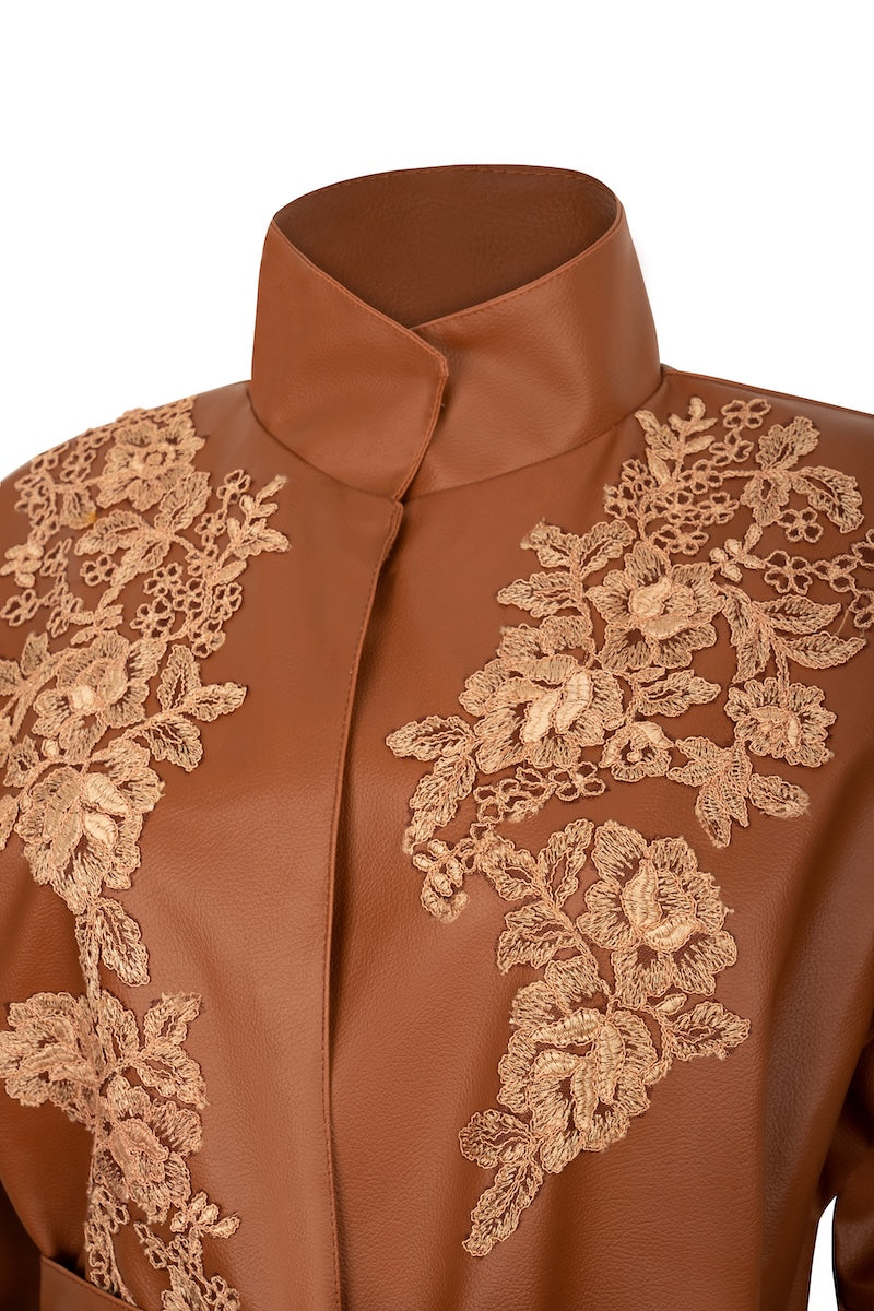 Nadya Shah CLEO faux leather belted jacket featuring a stylish design with a waist belt and classic jacket silhouette.