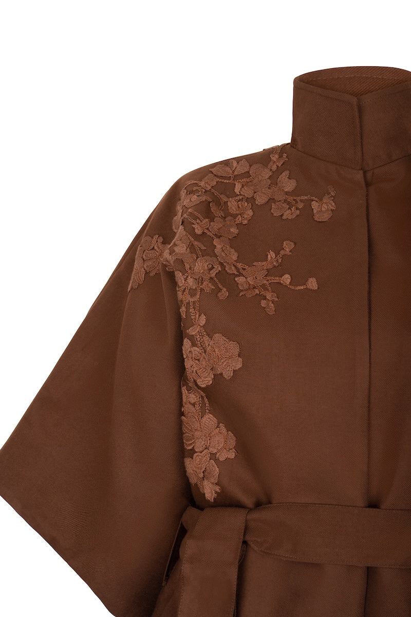 Nadya Shah mocha rose detail coat showing luxurious fabric, tailored fit, and stylish design perfect for elegant winter wear.
