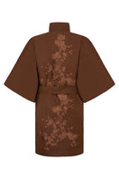 Nadya Shah mocha rose detail coat featuring elegant floral accents, tailored fit, and stylish design for sophisticated winter wear.