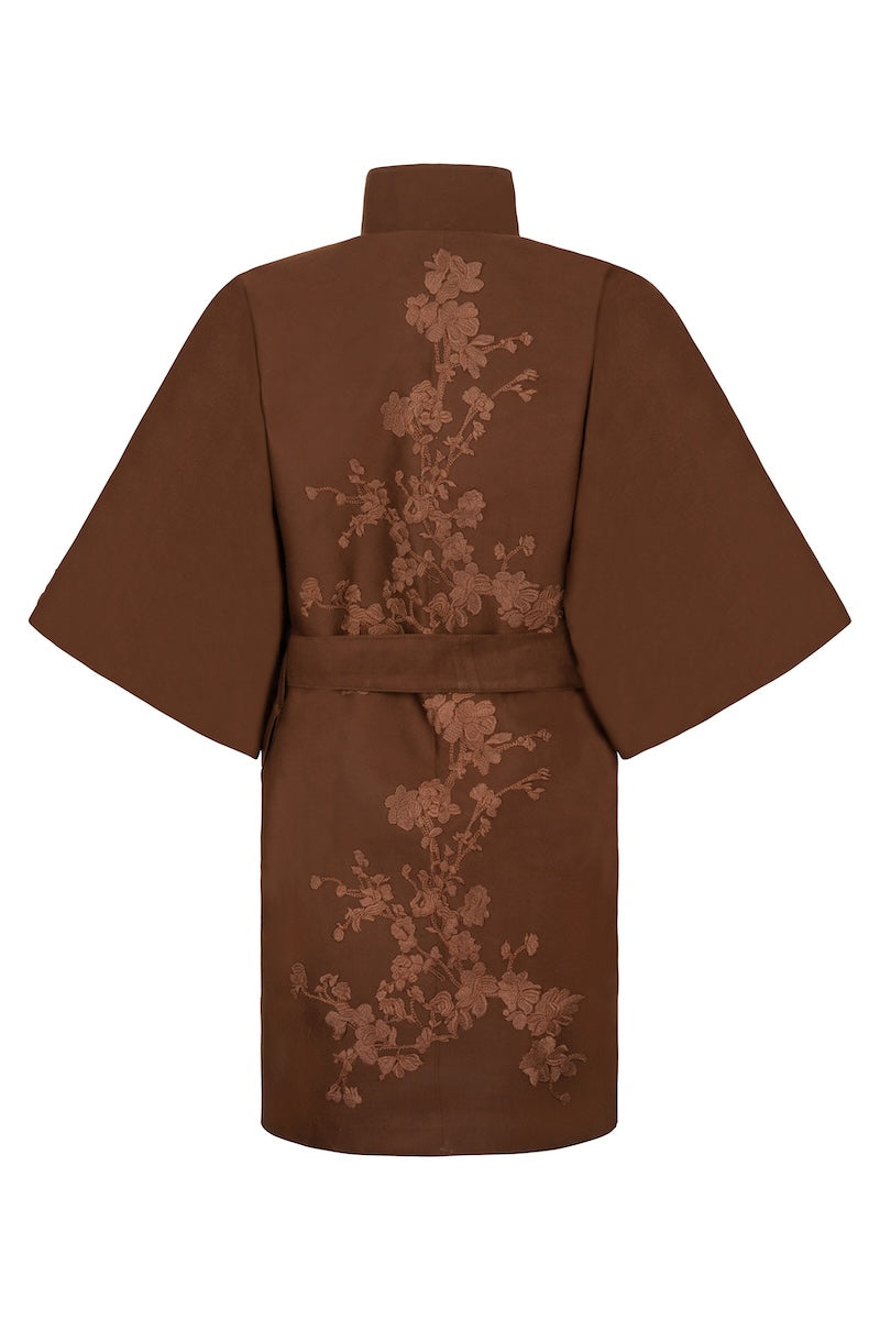 Nadya Shah mocha rose detail coat featuring elegant floral accents, tailored fit, and stylish design for sophisticated winter wear.