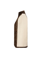Nadya Shah Balthazar Cape jacket in dark fabric, featuring a stylish draped design and open front, worn by a model.
