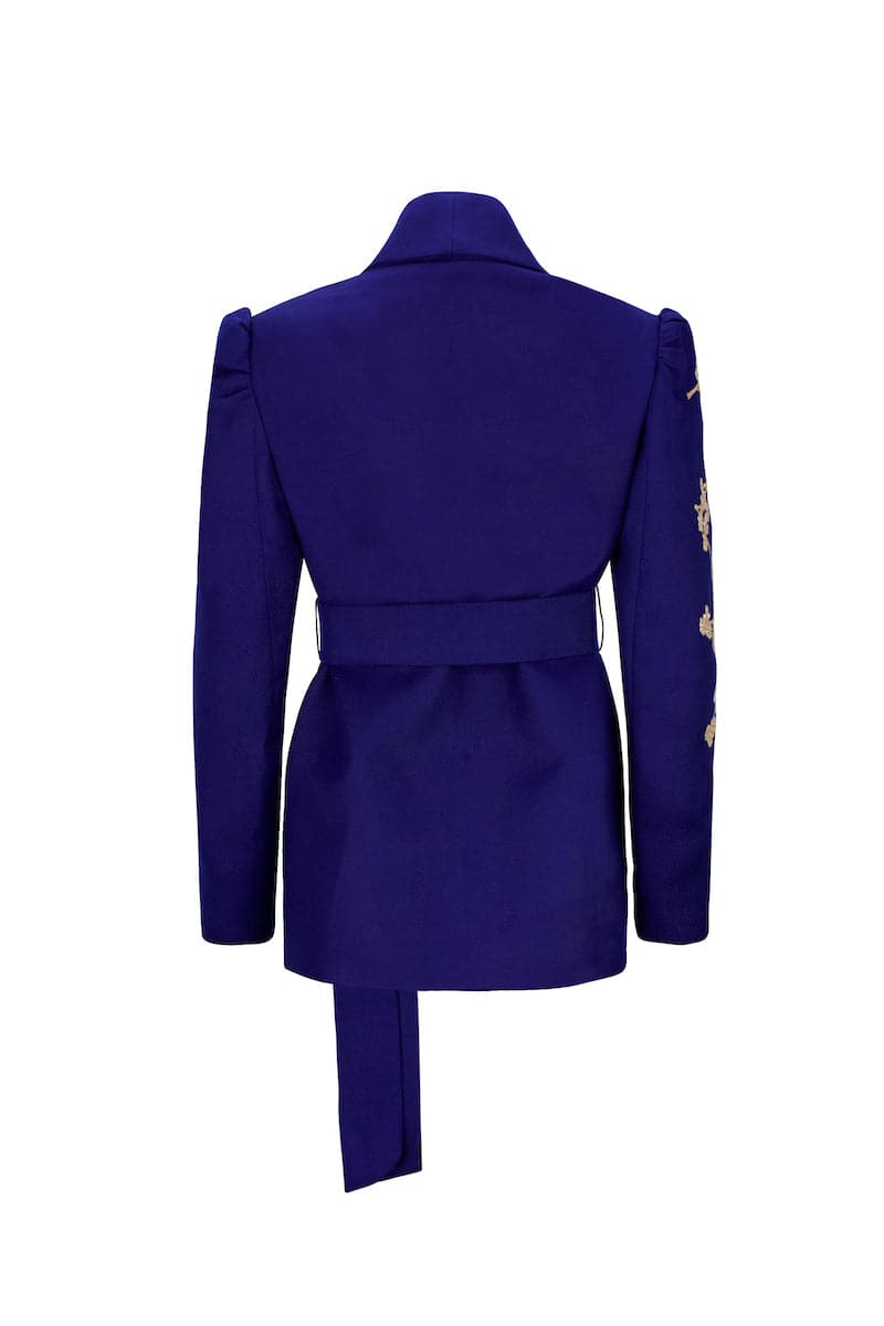 Nadya Shah Lily Fleur De Creasier Jacket showing floral pattern, tailored fit, and lightweight fabric on a hanger.
