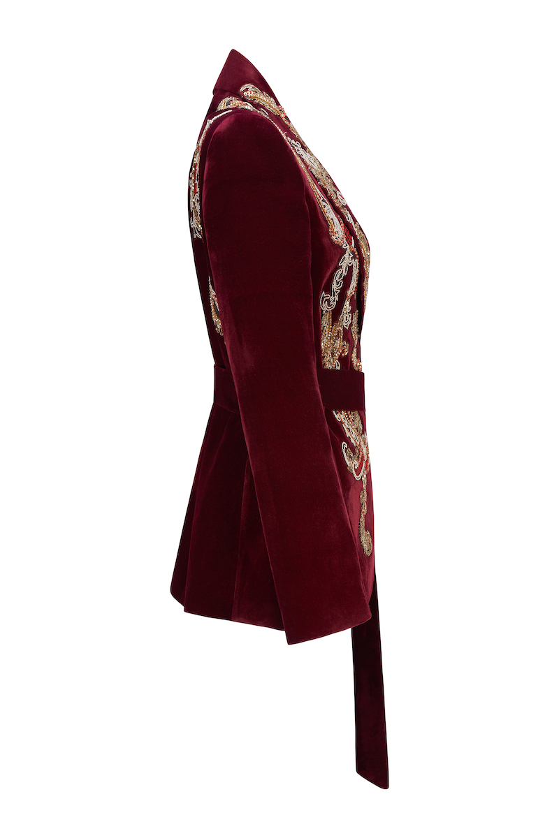 Nadya Shah men's brown smoking jacket with satin lapels, tailored fit, and luxurious fabric, displayed on a hanger.