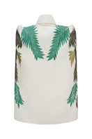Nadya Shah Cara Leaf Cape jacket featuring a vibrant leaf pattern, stylish long sleeves, and a flowing silhouette.