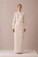 Nihan Peker NAREEN vanilla co-ords set featuring a stylish top and matching pants on a mannequin.