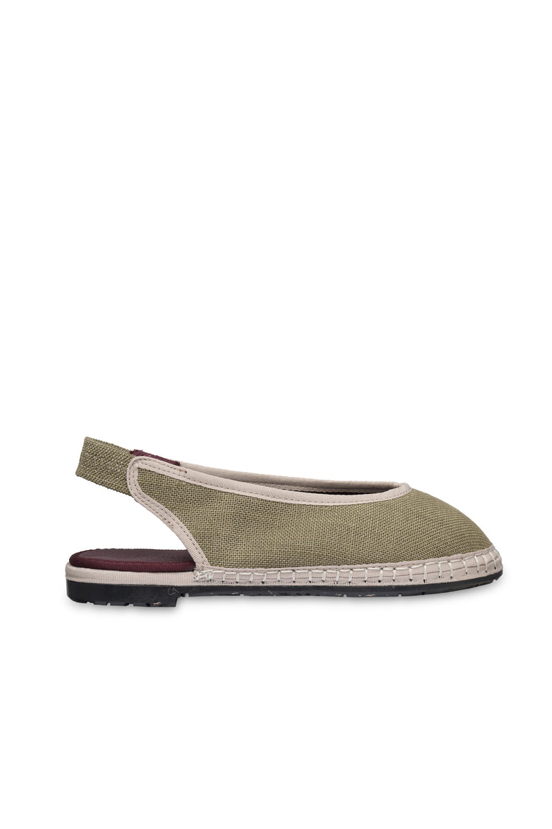Flabelus Narnia green linen flats with beige piping, featuring a comfortable slip-on design and stylish, casual footwear.