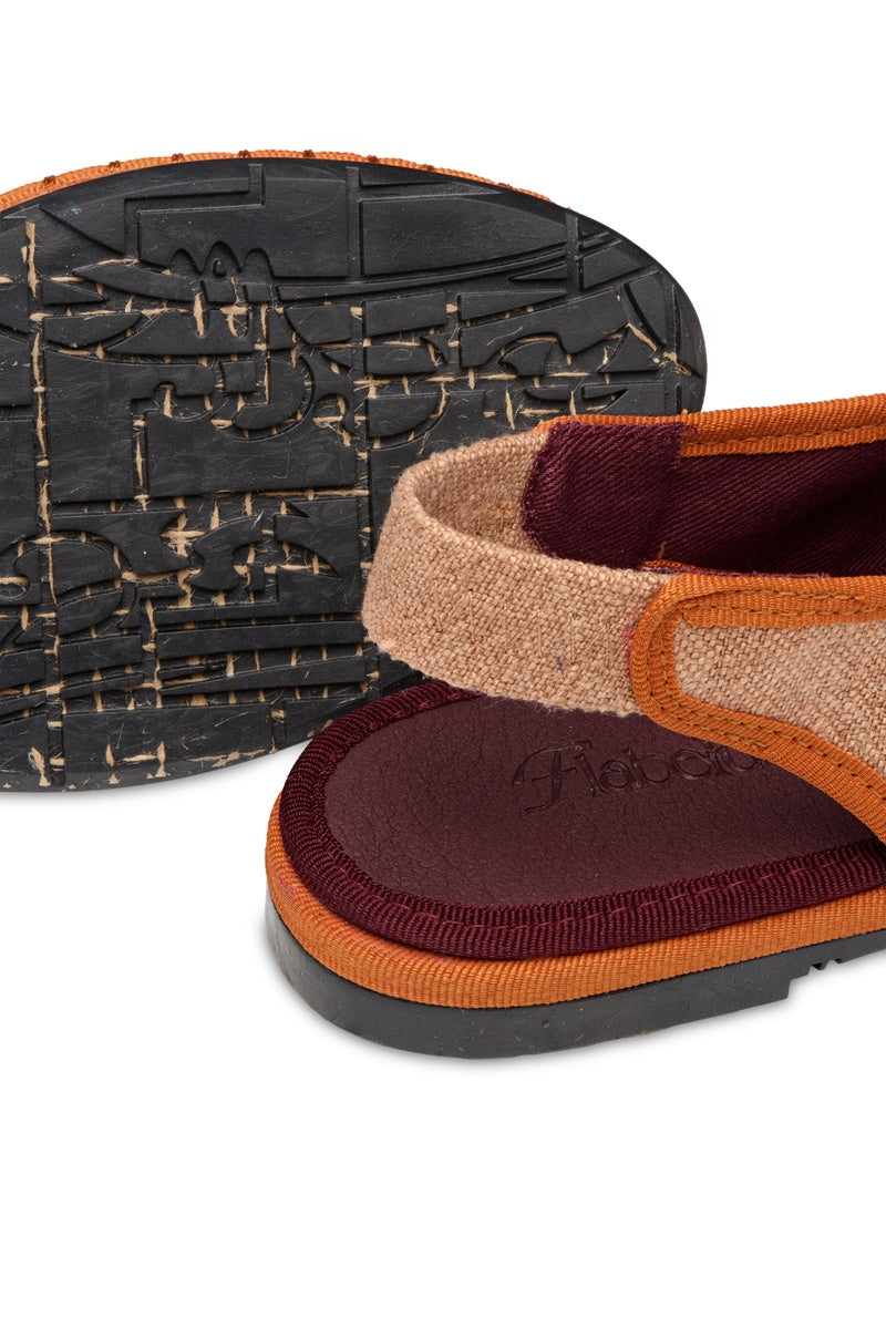 Flabelus Narnia brown flats featuring a sleek design with rounded toes and comfortable slip-on style for everyday wear.