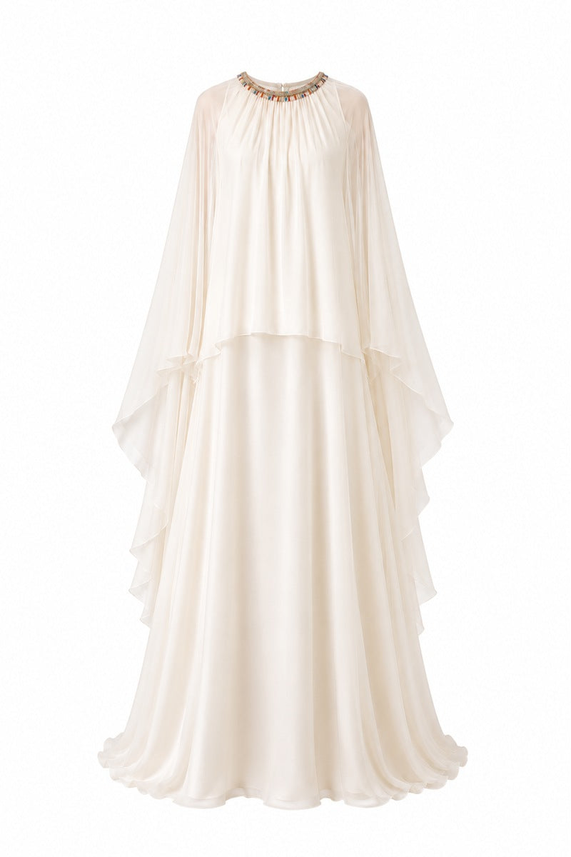 Nihan Peker Nazz vanilla gown featuring elegant fabric and flowing design, perfect for formal occasions.