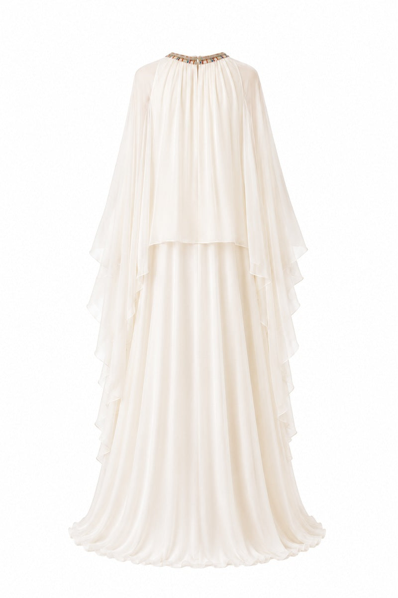 Nahan Peker Nazz vanilla gown with elegant fabric and flowing design, displayed on a mannequin.