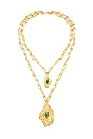 Gold and green nebula necklace by Jude Benhalim featuring intricate celestial-inspired design on a delicate chain.