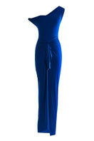 Deme by Gabriella Nellie electric blue draped maxi dress displayed on a hanger with flowing fabric and elegant design.