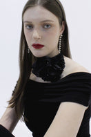 A pair of elegant MAJA Earrings by Aethera featuring sleek, modern design with polished metal finish on a plain background.