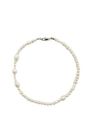 Aethera Cruisie Pearl Necklace featuring elegant white pearls on a delicate chain, perfect for sophisticated jewelry styling.