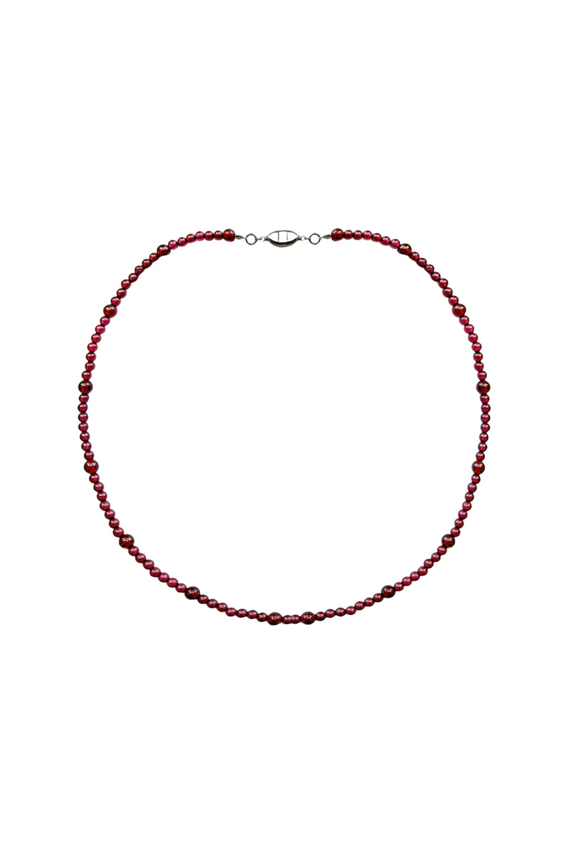 Aethera Baiana Ganet collar necklace featuring intricate gold-toned metalwork with detailed design elements.