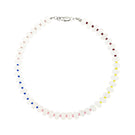 Aethera Resa white jade collar necklace featuring a smooth, polished white jade pendant on a delicate chain.