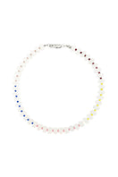 Aethera Resa white jade collar necklace featuring a smooth, polished white jade pendant on a delicate chain.