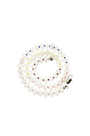 Aethera Resa white jade collar necklace featuring a smooth, polished white jade pendant on a delicate chain.
