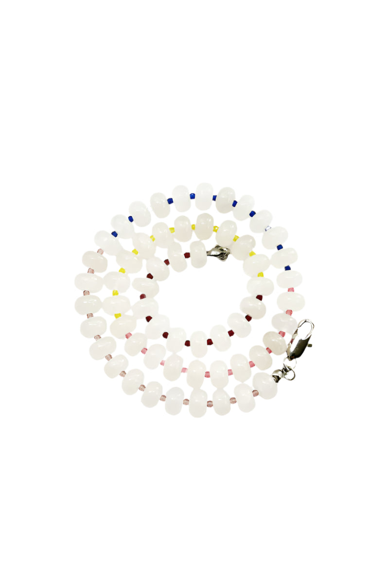 Aethera Resa white jade collar necklace featuring a smooth, polished white jade pendant on a delicate chain.