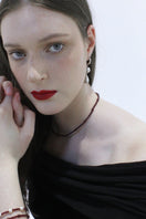Aethera Baiana Ganet collar necklace featuring intricate gold-toned design with detailed craftsmanship.