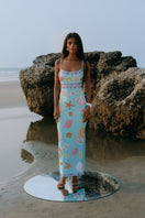 Blue New York strapped maxi dress by Oceanus, featuring a fitted bodice and flowing skirt, perfect for stylish summer wear.