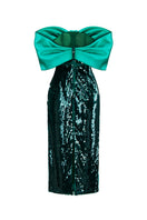 Green big bowtie gown by HACCHIC COUTURE featuring a flowing design and elegant style.