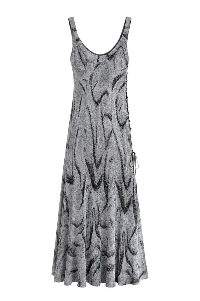 Maccapani Nice But Naughty black and silver maxi dress with elegant design and flowing fabric, perfect for stylish occasions.